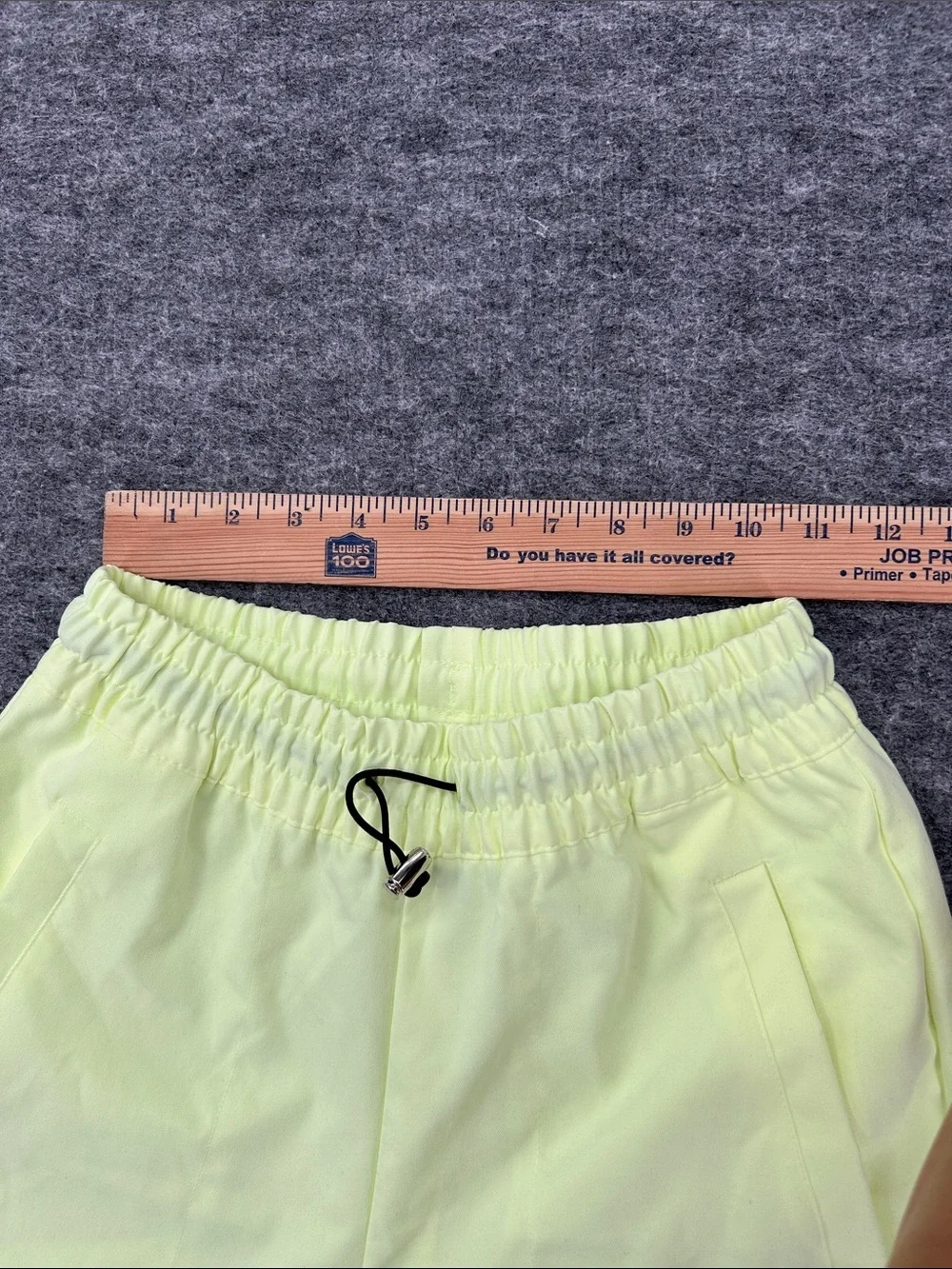 Nike Women's Sportswear Woven Pants in a bright neon green/yellow XS